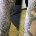 tatuaggio Braccio Fiore di Dna Tattoo