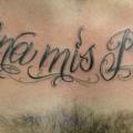 Chest Lettering tattoo by Evolution Tattoo