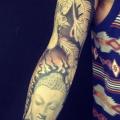 tatuaje Brazo Buda por Extreme Needle