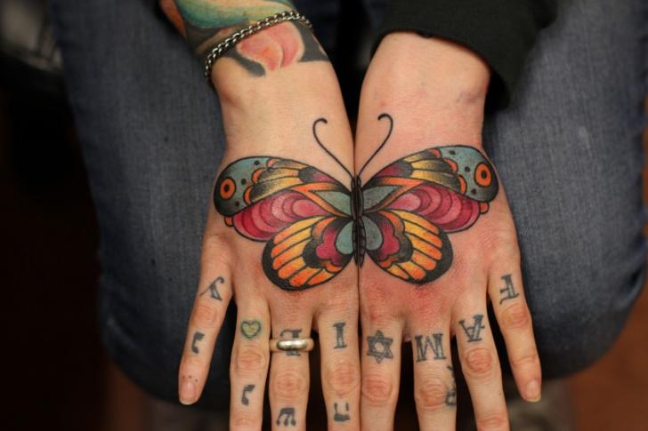 New School Hand Schmetterling Tattoo von Adrenaline Vancity