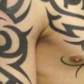 Shoulder Chest Tribal tattoo by Paul Egan Tattoo
