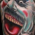 Fantasy Leg Clown tattoo by Cake Happy Tattoo