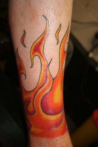 Arm Flammen Tattoo von Wrexham Ink