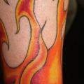 Arm Flammen tattoo von Wrexham Ink