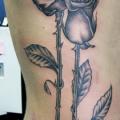 Realistic Flower Side tattoo by Anchors Tattoo
