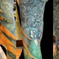 tatuaje Brazo Realista Pavo real por Orient Soul