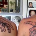 Shoulder Hands Draw Leonardo tattoo by Bugaboo Tattoo