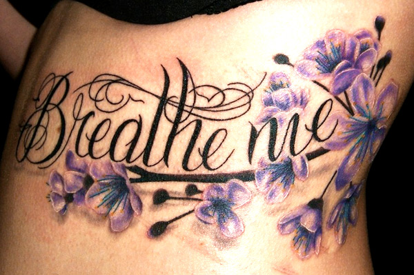 Flower Side Lettering Tattoo by Bugaboo Tattoo