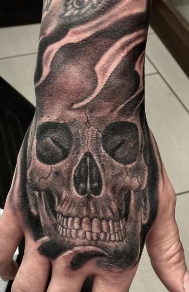 Skull Hand Tattoo by Richard Vega Tattoos