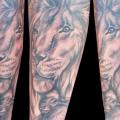 Arm Realistic Lion tattoo by Divinity Tattoo