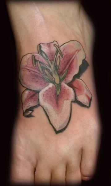 Tatuaje Realista Pie Flor por Divinity Tattoo