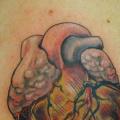 Schulter Herz tattoo von Divinity Tattoo