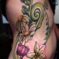 Side Flowers tattoo by Empire State Studios