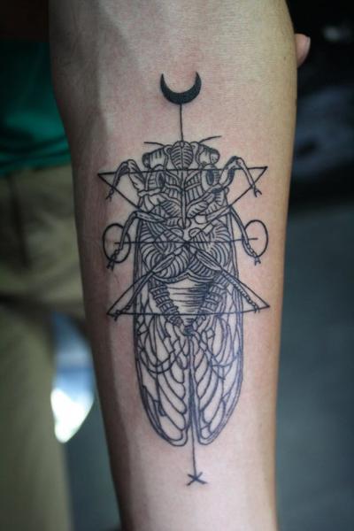 Arm Moth Tattoo by Bloody Blue Tattoo
