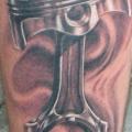 Arm Realistic Piston tattoo by Bloody Blue Tattoo