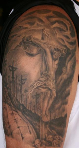 Tatouage Épaule Jésus Optique par Flesh Tattoo Company