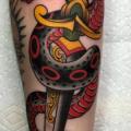 Arm Snake Dagger tattoo by Full Circle Tattoos