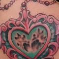 Shoulder Heart Medallion tattoo by Gold Rush Tattoo