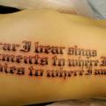 Side Lettering tattoo by Gold Rush Tattoo