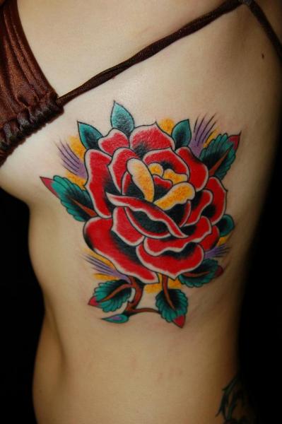 Old School Flower Side Tattoo by Gold Rush Tattoo