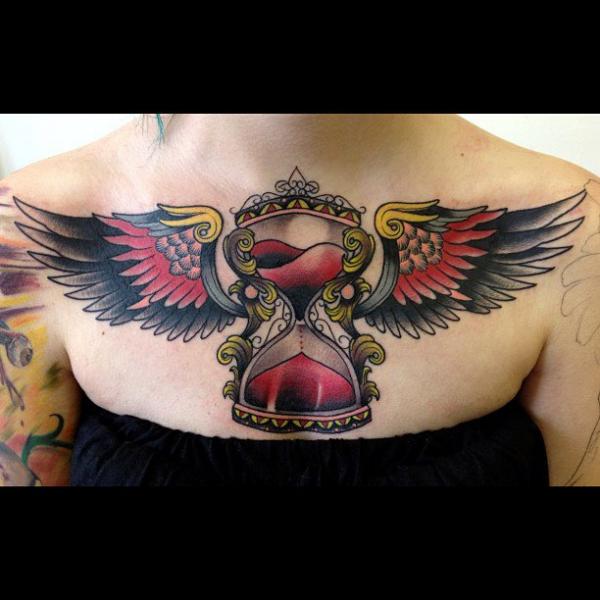 Old School Clepsydra Wings Breast Tattoo by Graceland Tattoo