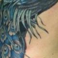 Realistic Side Peacock tattoo by Guru Tattoo
