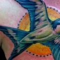 Brust Schwalben tattoo von Ink and Dagger Tattoo