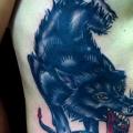 Snake Old School Side Wolf tattoo by Ink and Dagger Tattoo