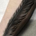 Arm Realistic Feather tattoo by Invisible Nyc