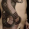 Schlangen Seite tattoo von Invisible Nyc