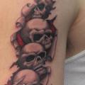 tatuaje Brazo Cráneo por Inxon Tattoo