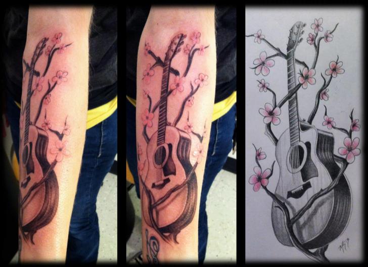 Arm Realistic Guitar Tattoo by Liquid Chaos Tattoos