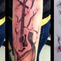 Arm Realistic Guitar tattoo by Liquid Chaos Tattoos