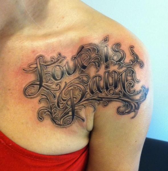 Shoulder Lettering Tattoo by Liquid Chaos Tattoos