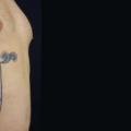 tatuaggio Fianco Balena di Belly Button Tattoo Shop