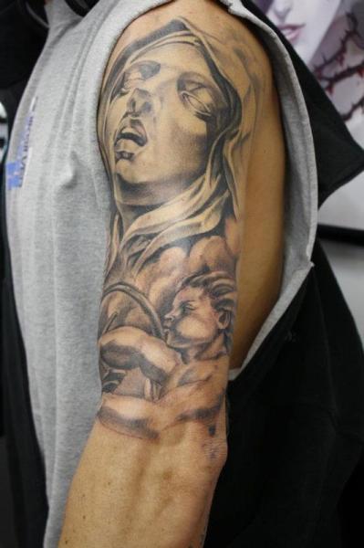 Arm Statue Tattoo by Lucky Bamboo Tattoo