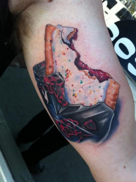 Arm Realistic Cake Tattoo by Mike DeVries Tattoos