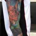 Arm Realistic Bird Monkey Giraffe tattoo by Mike DeVries Tattoos