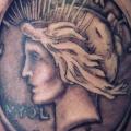 Shoulder Coin tattoo by Memorial Tattoo