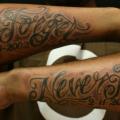 Arm Leuchtturm Fonts tattoo von Omaha Tattoo
