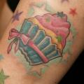 Hand Cake tattoo by Oregon Coast Tattoo