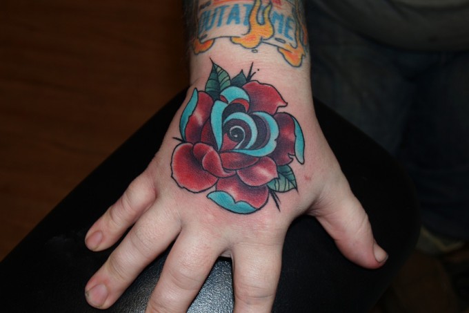New School Flower Hand Tattoo by Pino Bros Ink