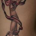 Realistische Seite Frauen tattoo von Rebellion Tattoo