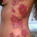Flower Side tattoo by Sakura Tattoos