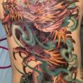 tatuaje Espalda Dragón por Dimitri Tattoo