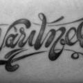 tatuaje Brazo Letras Fuentes por Czi Tattoo Studio