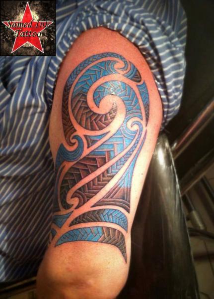 Tatuaggio Braccio Tribali di Samed Ink Tattoos
