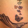 Seite Rücken Schmetterling tattoo von Samed Ink Tattoos