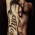 Side Lettering Fonts tattoo by Tatist Tattoo