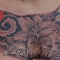 Flower Breast tattoo by Andys Body Electric